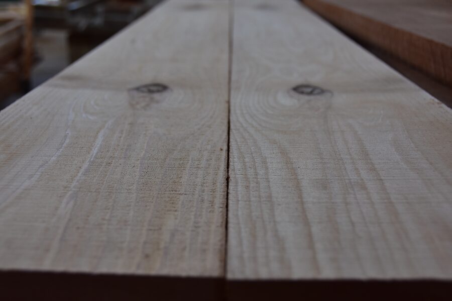 Book-matched white oak boards showing grain match for a custom door