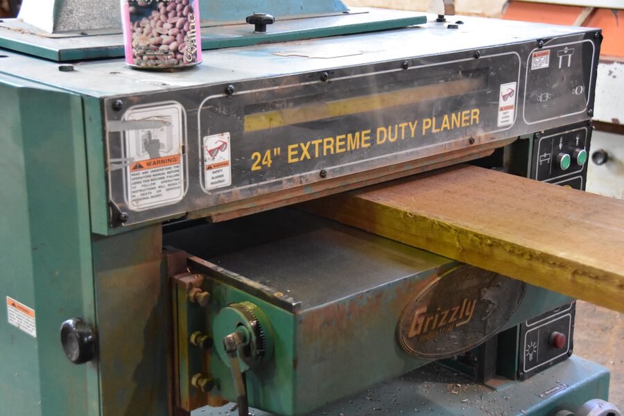 Hardwood door stock running through the 24-inch thickness planer