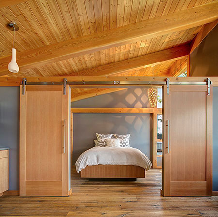 Beautiful Sliding Barn Doors on a Rustic Bedroom