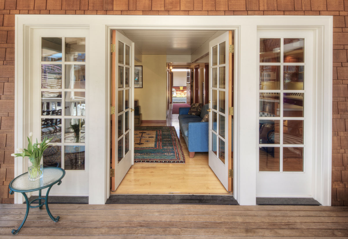 Exterior French doors on patio opening to living area