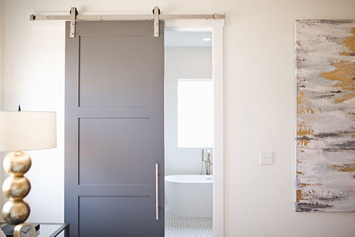 Sliding Barn Door leading to Bathroom